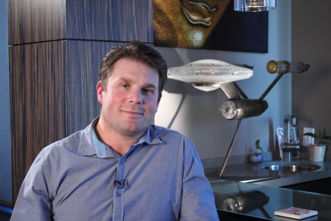 Rod Roddenberry during Chasing Atlantis Interview. Yes, that Enterprise in the back is completely made of glass and one of a kind